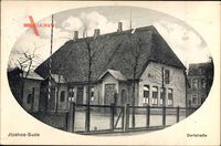 Passepartout Sude Itzehoe in Schleswig Holstein, Dorfstraße,Haus mit Reetdach