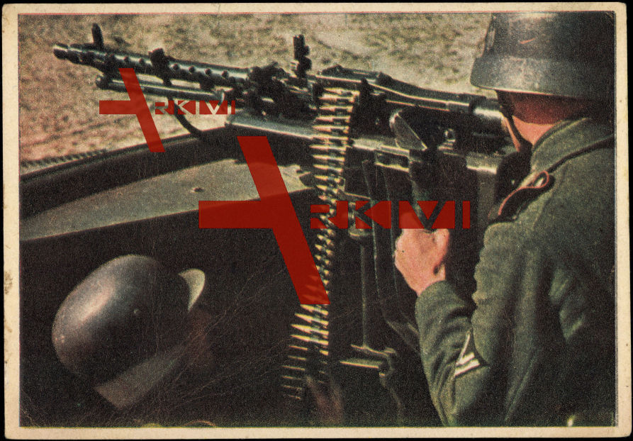 Wehrmacht, Soldaten am Maschinengewehr in Deckung