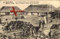 Ganzsachen Dem. Rep. Kongo,Noirs réunissant bois pour chauffage des vapeurs