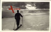 Am Feldberg, Skifahrer, Sonnenstrahlen, Wolken, Eismeer