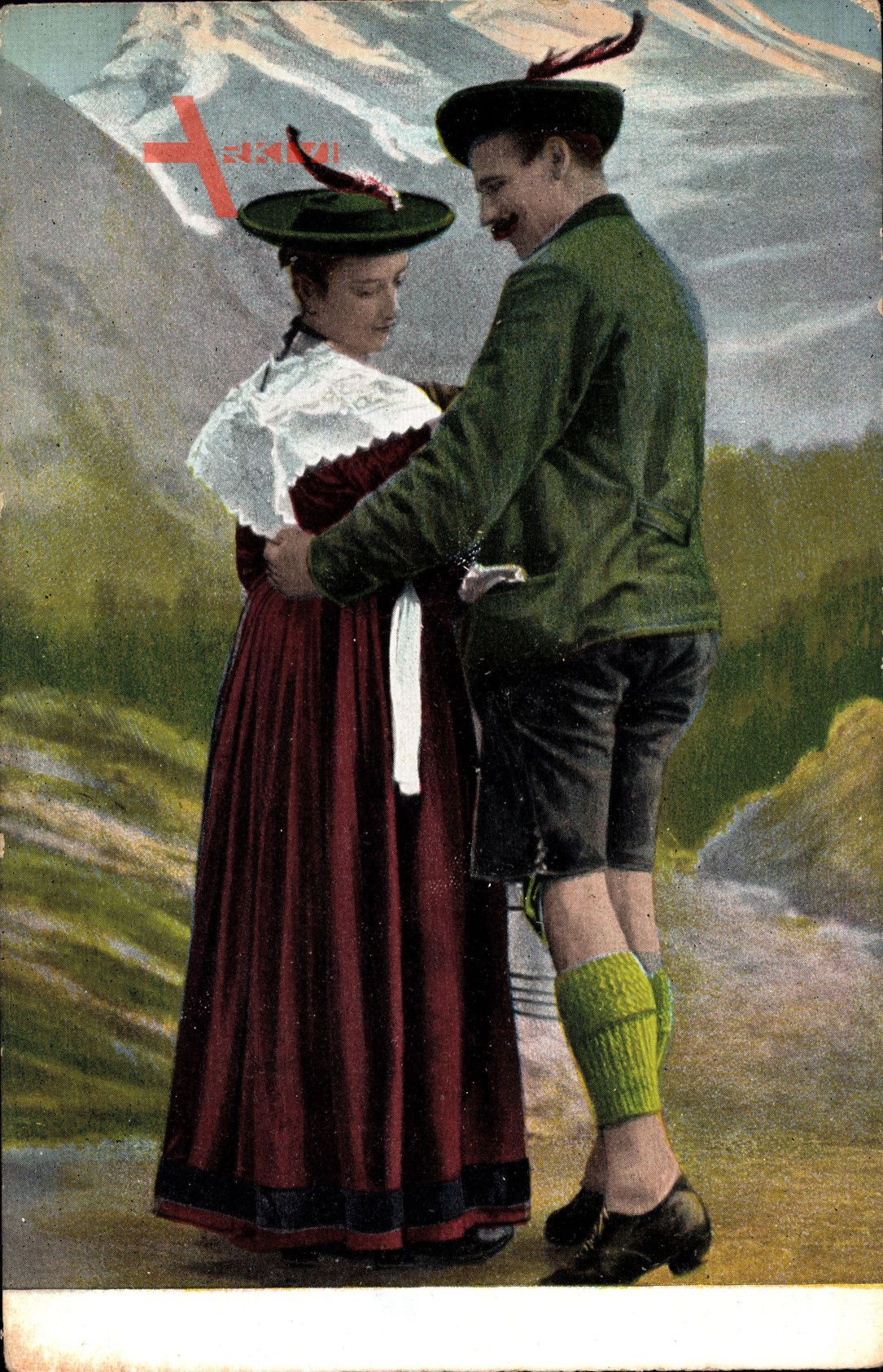 Paar in bayrischen Landestrachten, Lederhosen, Federhüte